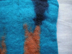 Stulpen für die Hände aus 100% Wolle, gefilzt, orange-türkis-blau, detail